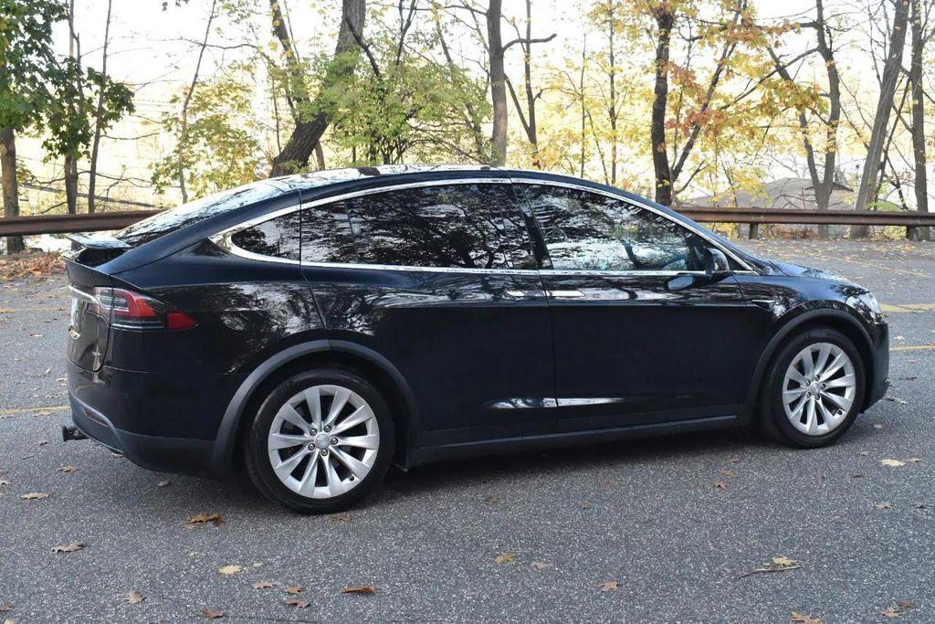 used 2018 Tesla Model X car, priced at $21,895