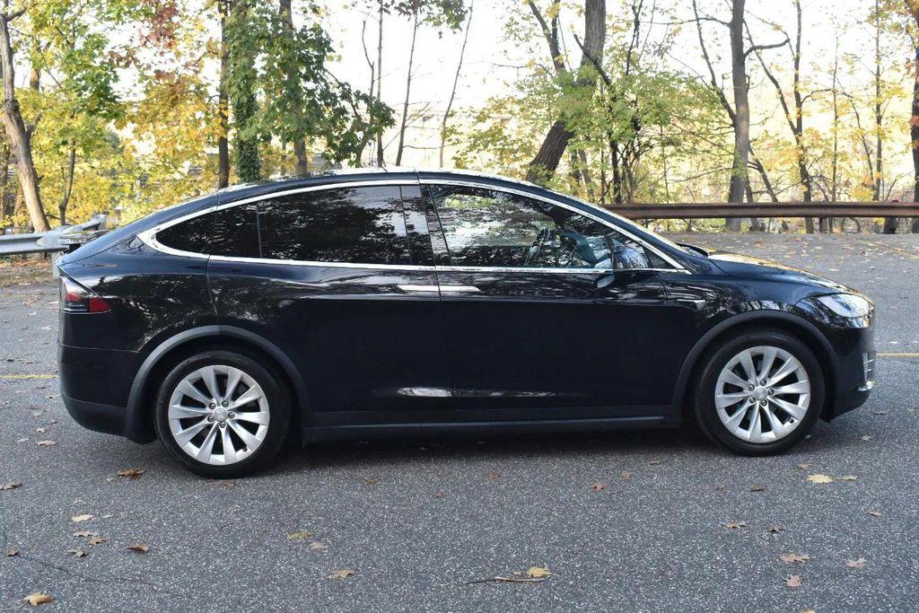 used 2018 Tesla Model X car, priced at $21,895