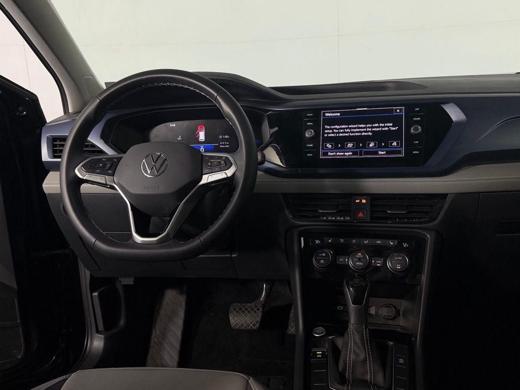 used 2024 Volkswagen Taos car, priced at $22,973