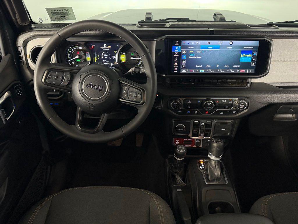 used 2025 Jeep Wrangler 4xe car, priced at $29,573
