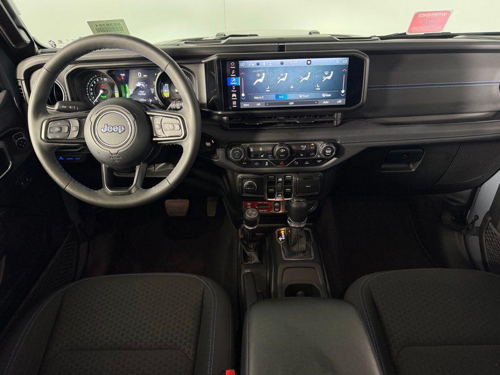 used 2025 Jeep Wrangler 4xe car, priced at $33,073