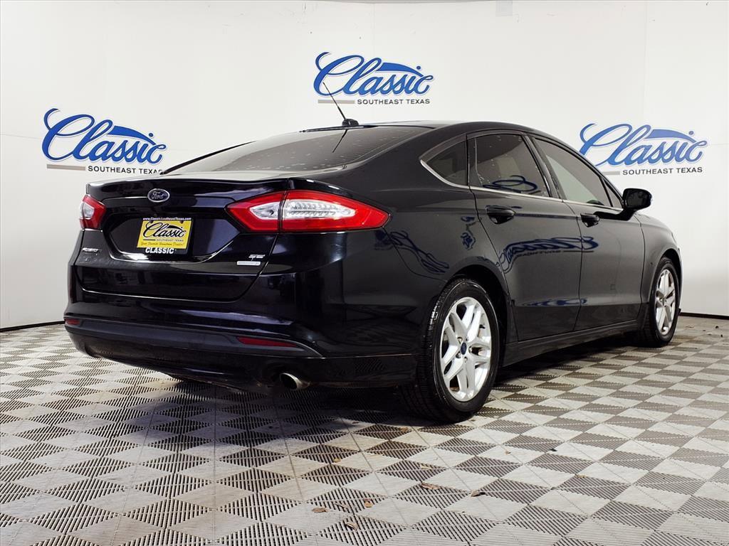 used 2016 Ford Fusion car, priced at $5,995
