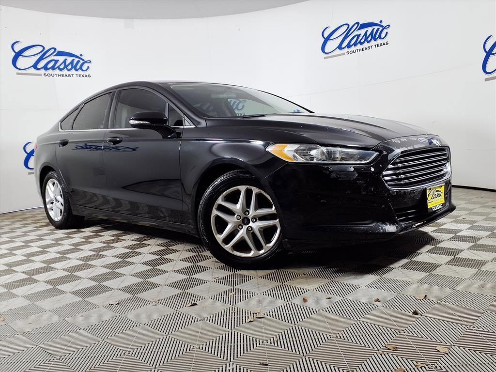 used 2016 Ford Fusion car, priced at $5,995