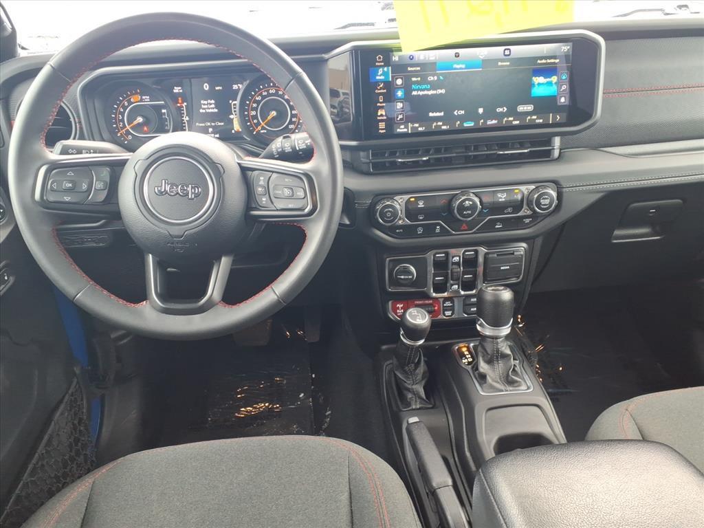 used 2024 Jeep Wrangler car, priced at $39,298
