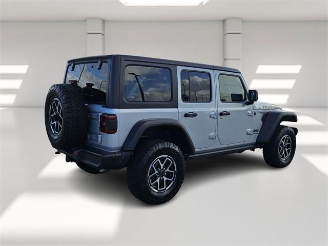 used 2024 Jeep Wrangler car, priced at $38,312