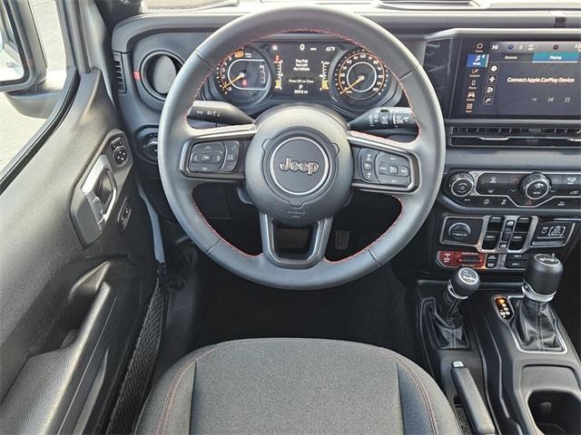 used 2024 Jeep Wrangler car, priced at $38,312