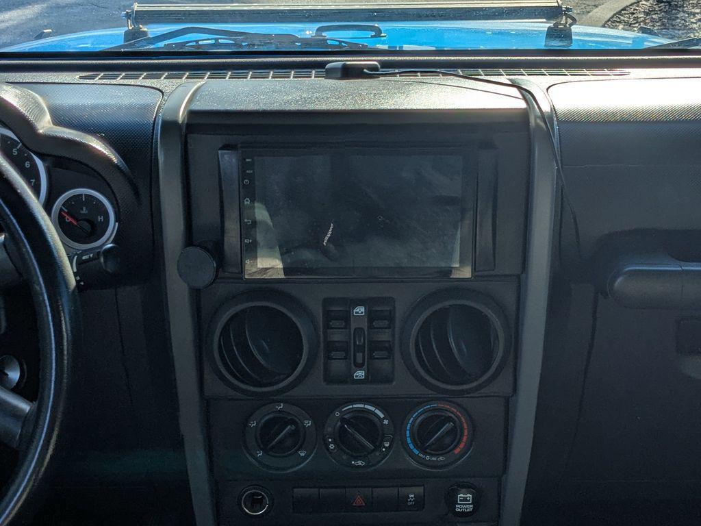 used 2010 Jeep Wrangler Unlimited car, priced at $13,484