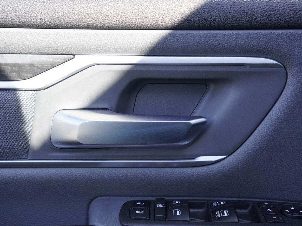 used 2021 Ram 1500 car, priced at $23,165
