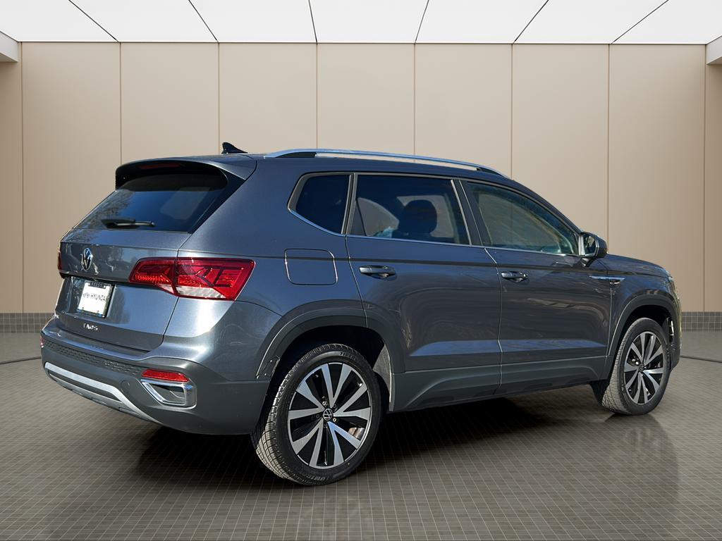 used 2023 Volkswagen Taos car, priced at $21,700
