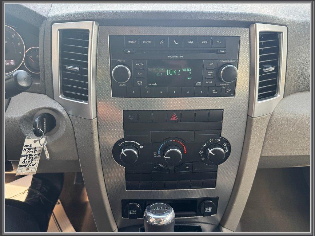 used 2010 Jeep Grand Cherokee car, priced at $9,999