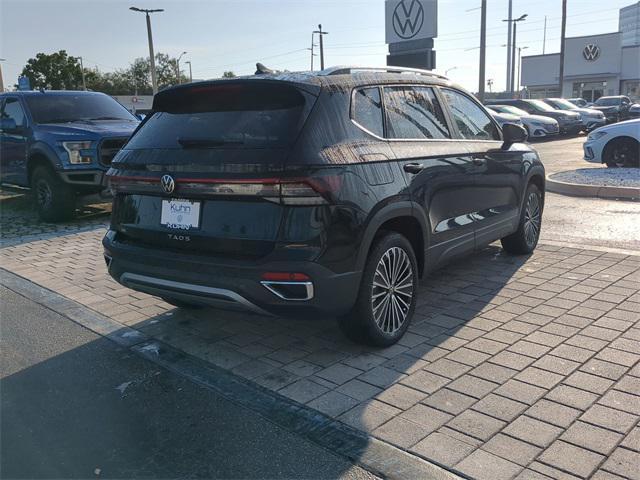 new 2025 Volkswagen Taos car, priced at $23,996