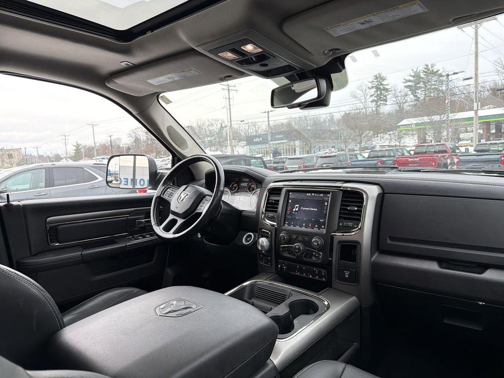 used 2018 Ram 1500 car, priced at $28,709