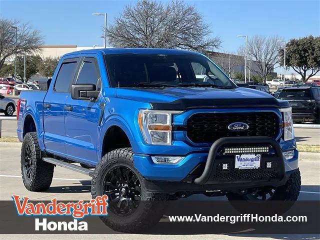 used 2021 Ford F-150 car, priced at $27,639