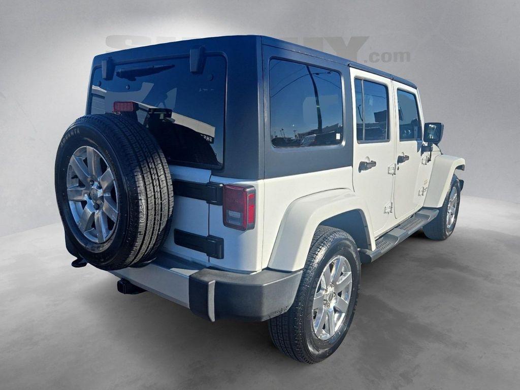 used 2015 Jeep Wrangler Unlimited car, priced at $17,741
