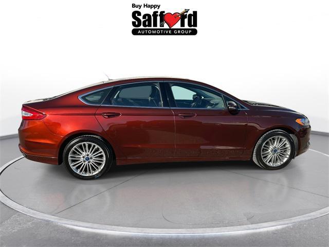 used 2016 Ford Fusion car, priced at $11,899
