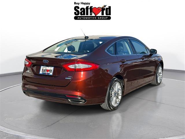 used 2016 Ford Fusion car, priced at $11,899