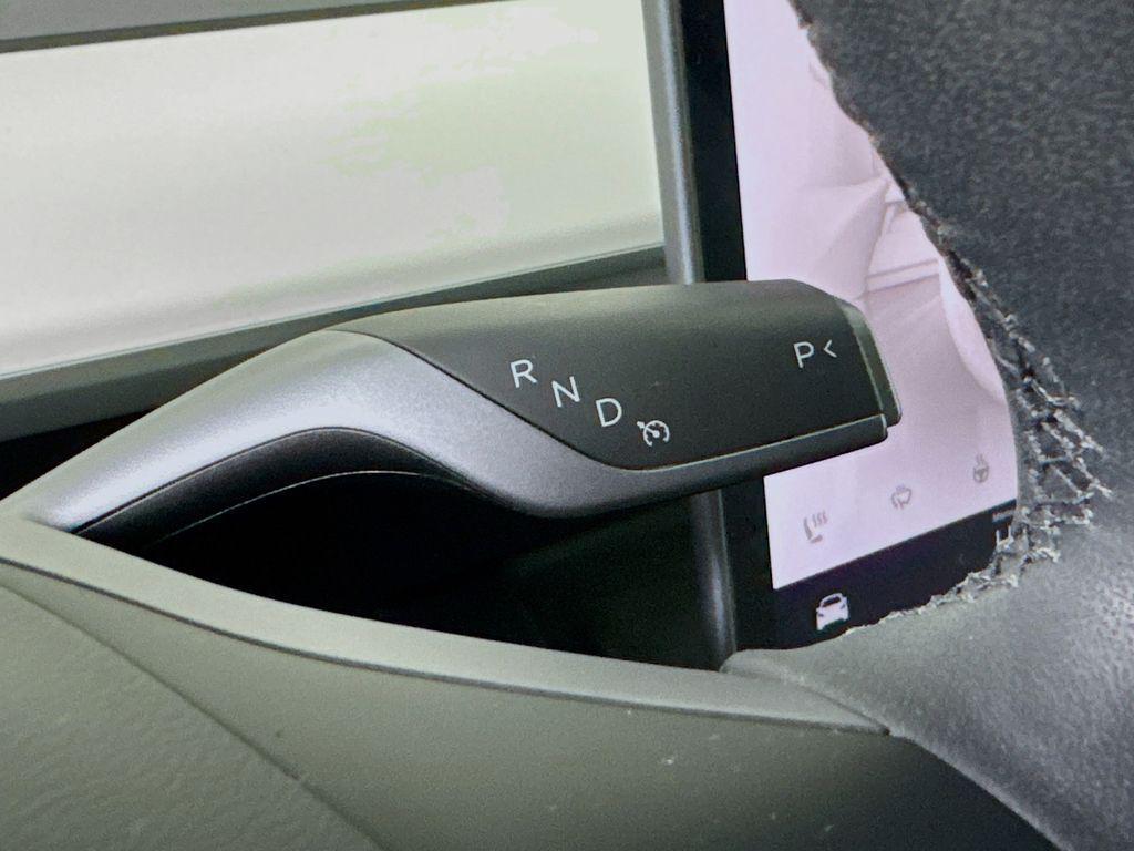 used 2024 Tesla Model Y car, priced at $38,145