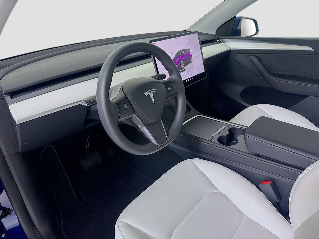 used 2024 Tesla Model Y car, priced at $38,145