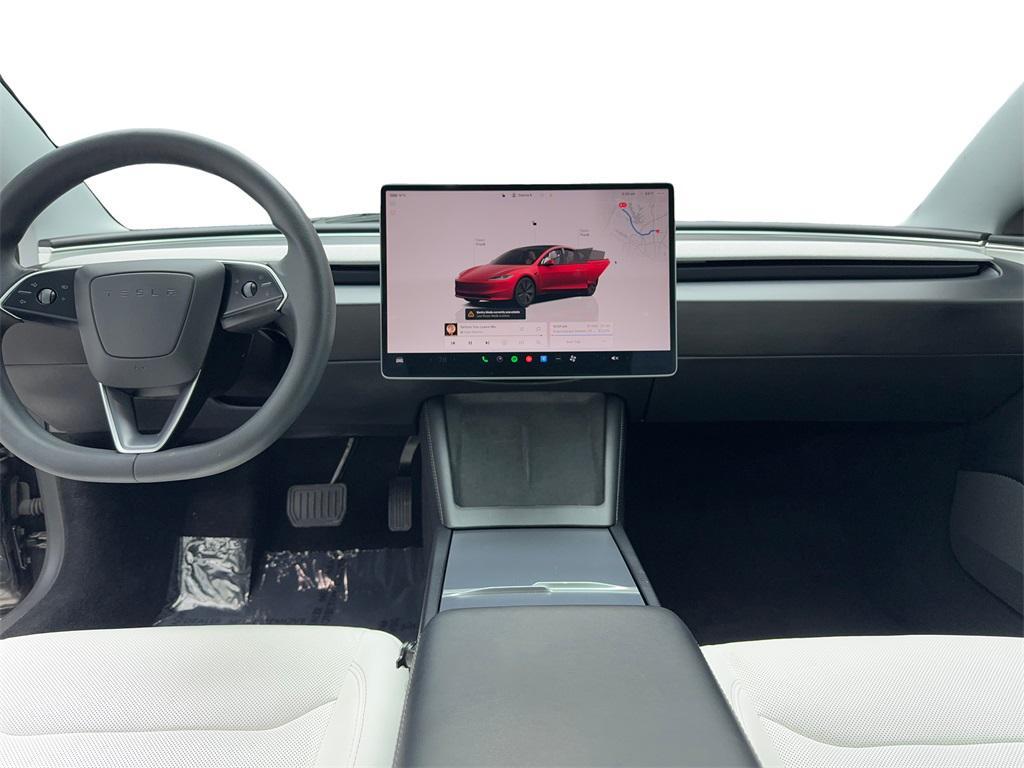 used 2025 Tesla Model 3 car, priced at $34,629