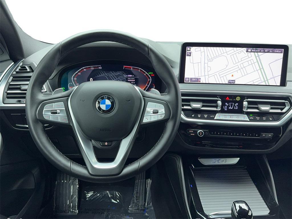 used 2025 BMW X4 car, priced at $42,903