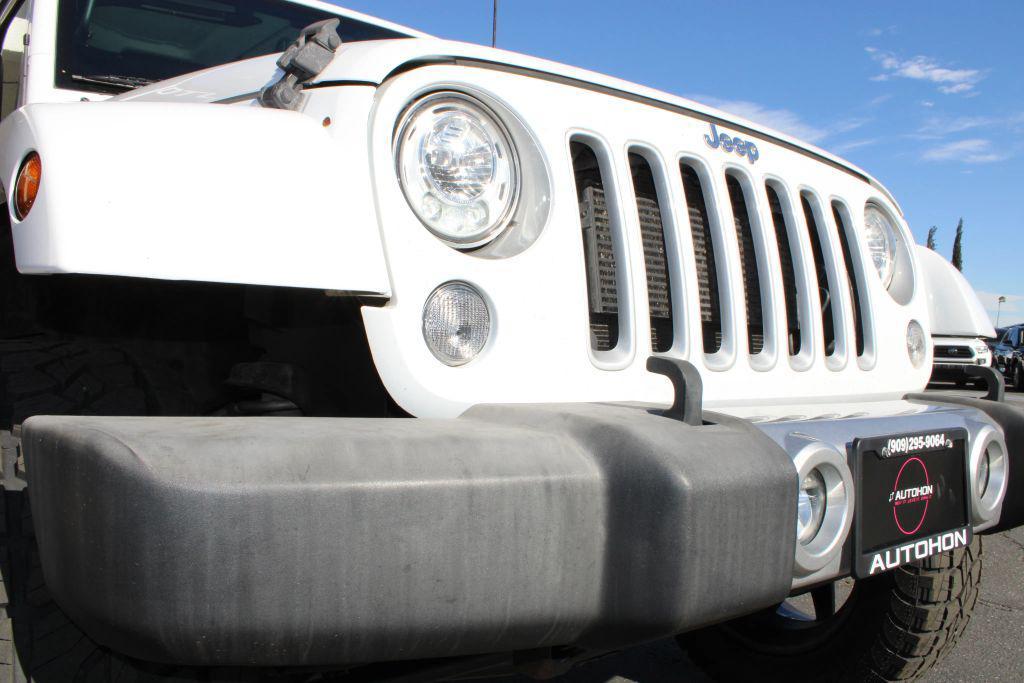 used 2018 Jeep Wrangler JK Unlimited car, priced at $17,900