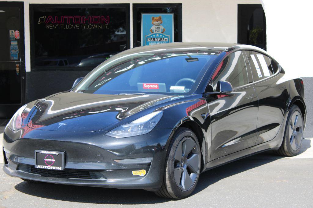 used 2022 Tesla Model 3 car, priced at $18,000