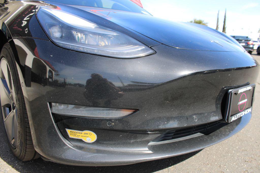 used 2022 Tesla Model 3 car, priced at $18,000