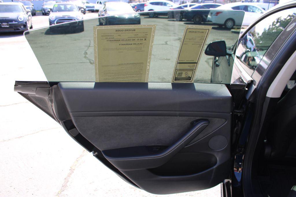 used 2022 Tesla Model 3 car, priced at $18,000