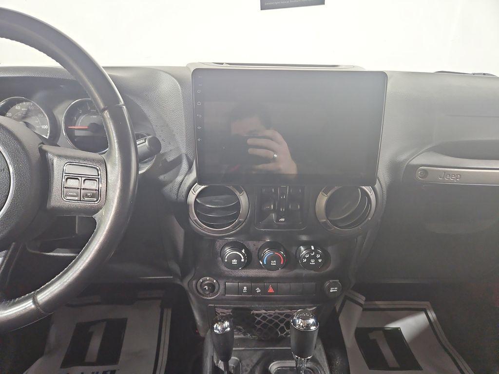 used 2016 Jeep Wrangler Unlimited car, priced at $14,923