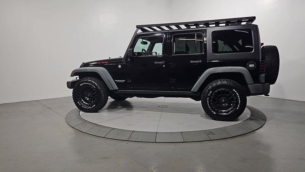 used 2014 Jeep Wrangler Unlimited car, priced at $16,116