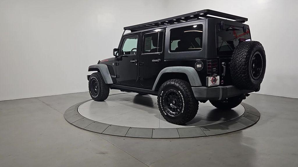 used 2014 Jeep Wrangler Unlimited car, priced at $16,116
