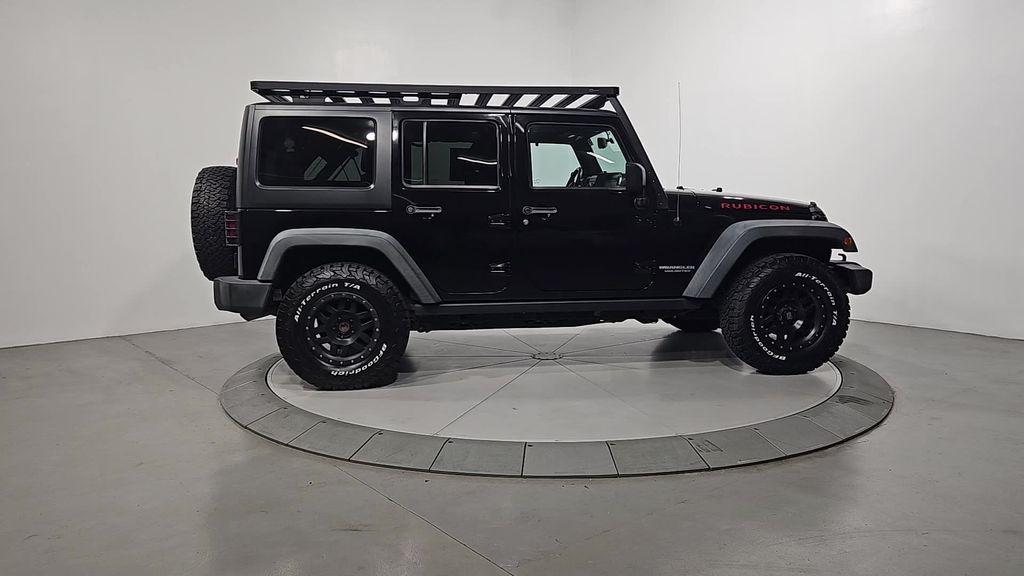 used 2014 Jeep Wrangler Unlimited car, priced at $16,116