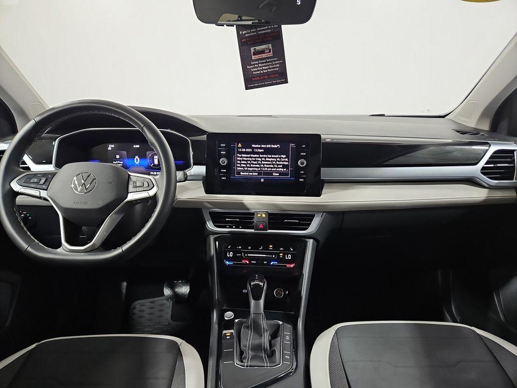 used 2025 Volkswagen Taos car, priced at $24,514