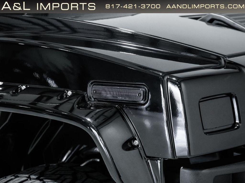 used 2009 Hummer H2 car, priced at $74,950