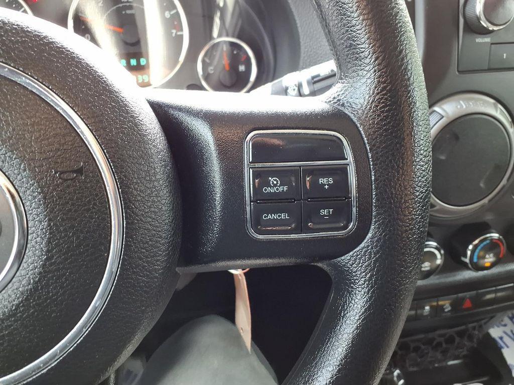 used 2014 Jeep Wrangler Unlimited car, priced at $13,649