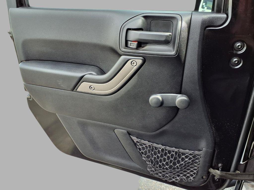 used 2014 Jeep Wrangler Unlimited car, priced at $13,649