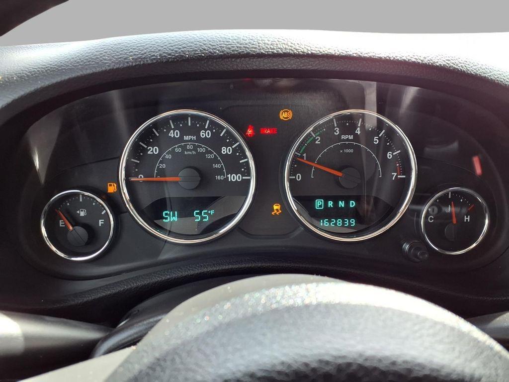 used 2014 Jeep Wrangler Unlimited car, priced at $13,649