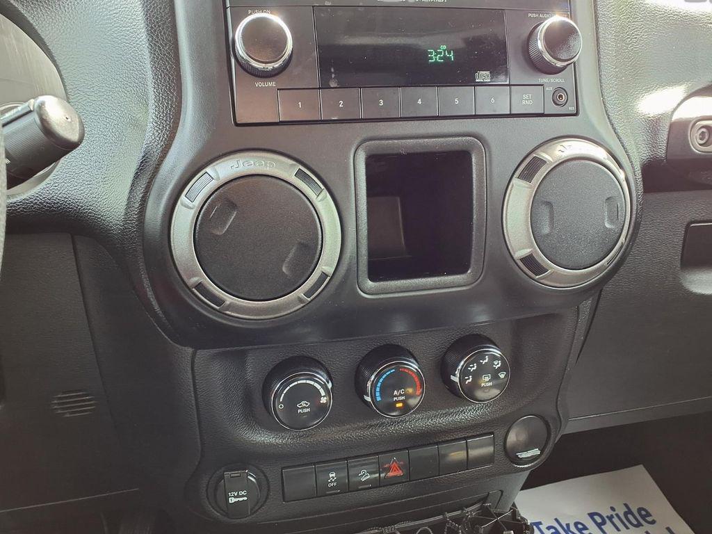 used 2014 Jeep Wrangler Unlimited car, priced at $13,649