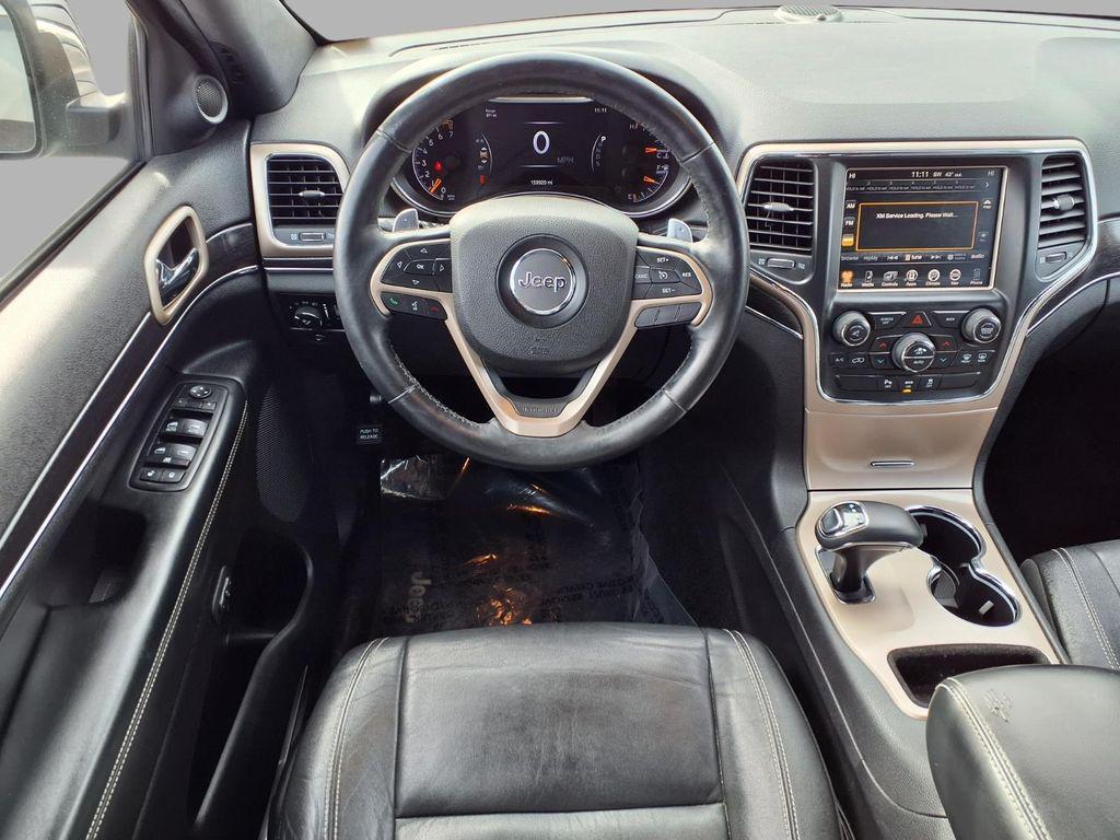 used 2014 Jeep Grand Cherokee car, priced at $9,401