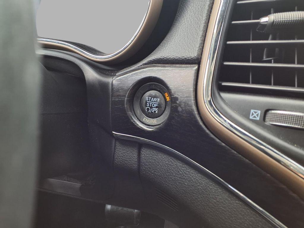 used 2014 Jeep Grand Cherokee car, priced at $9,401