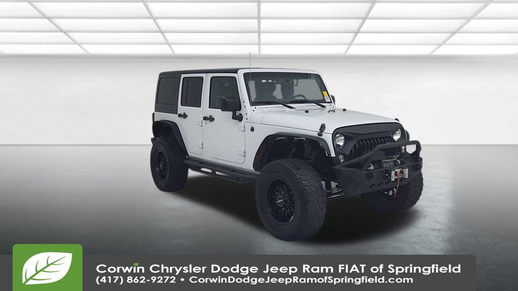 used 2015 Jeep Wrangler Unlimited car, priced at $15,997