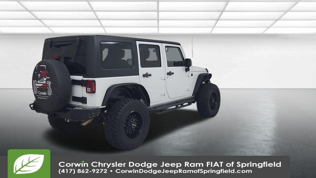 used 2015 Jeep Wrangler Unlimited car, priced at $15,997
