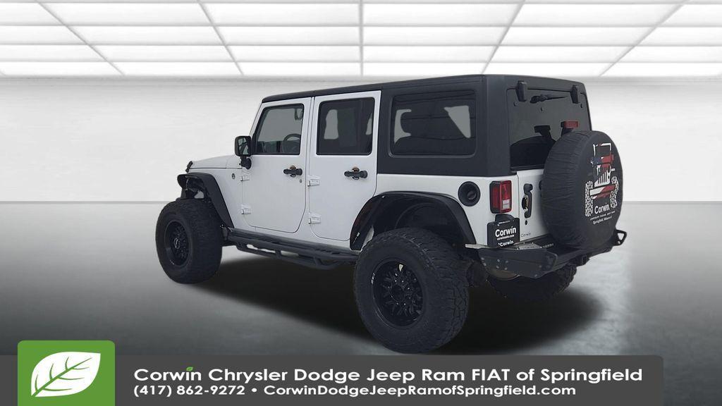 used 2015 Jeep Wrangler Unlimited car, priced at $15,997