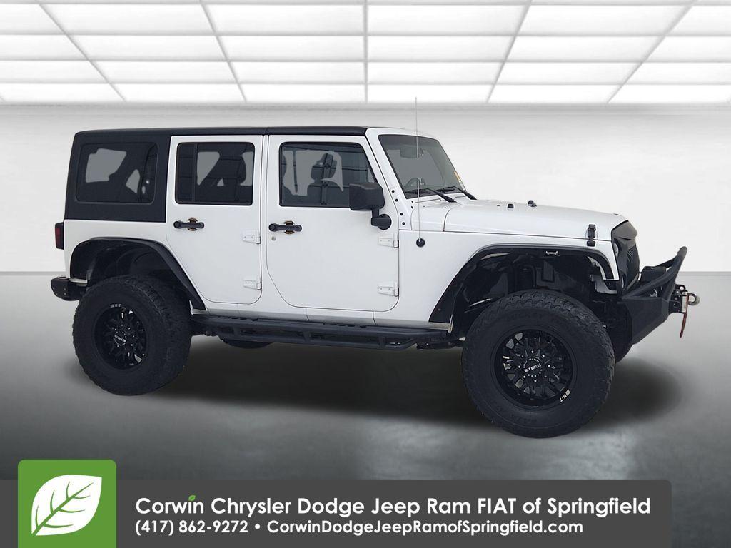used 2015 Jeep Wrangler Unlimited car, priced at $15,997