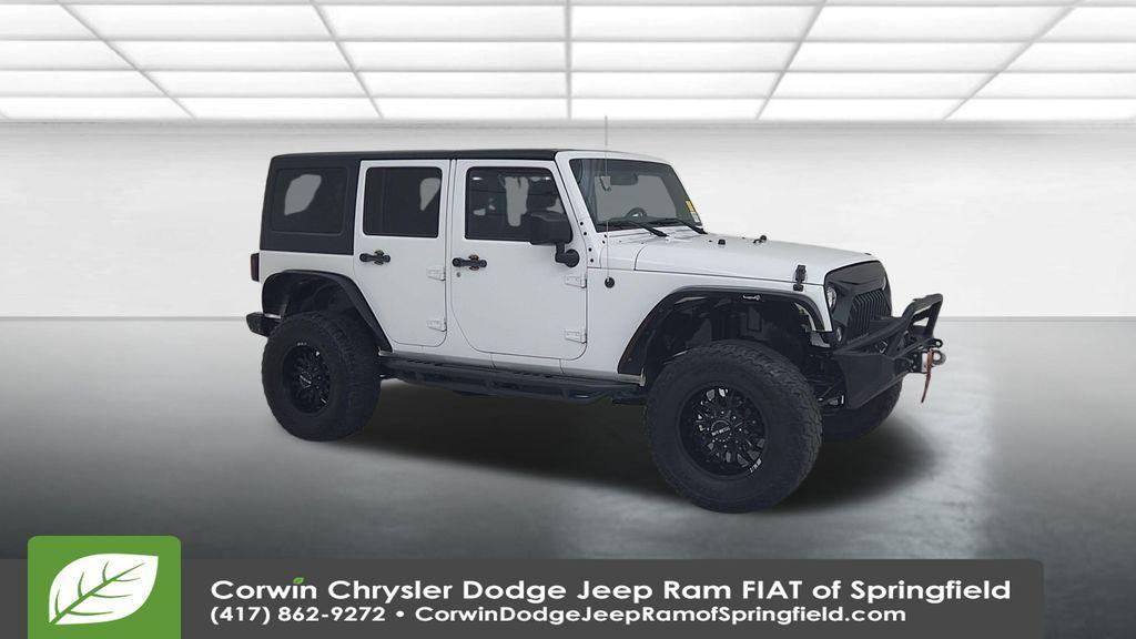used 2015 Jeep Wrangler Unlimited car, priced at $15,997