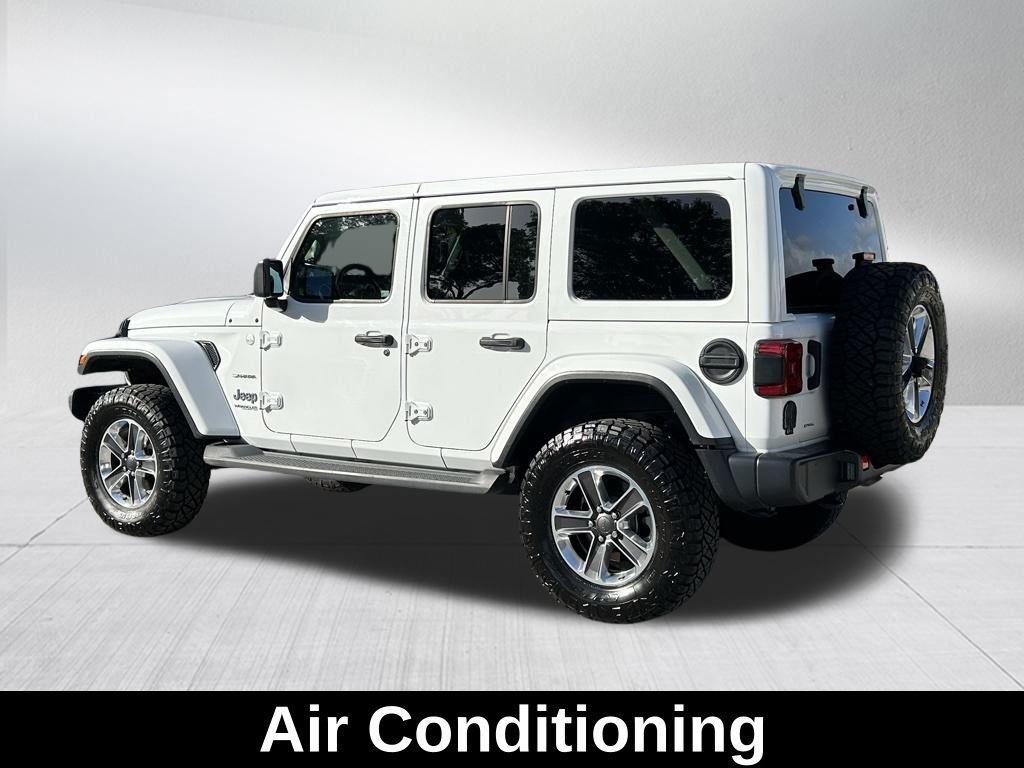used 2021 Jeep Wrangler Unlimited car, priced at $27,896