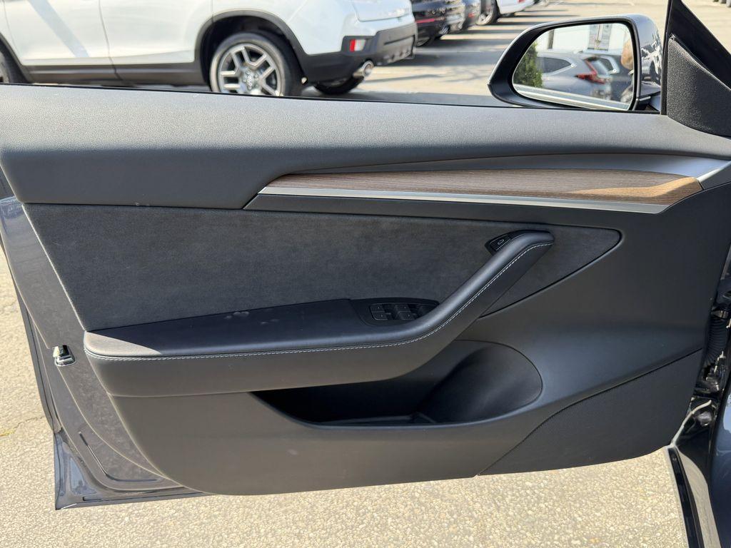 used 2023 Tesla Model 3 car, priced at $27,551
