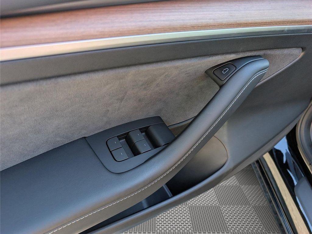 used 2023 Tesla Model 3 car, priced at $27,299