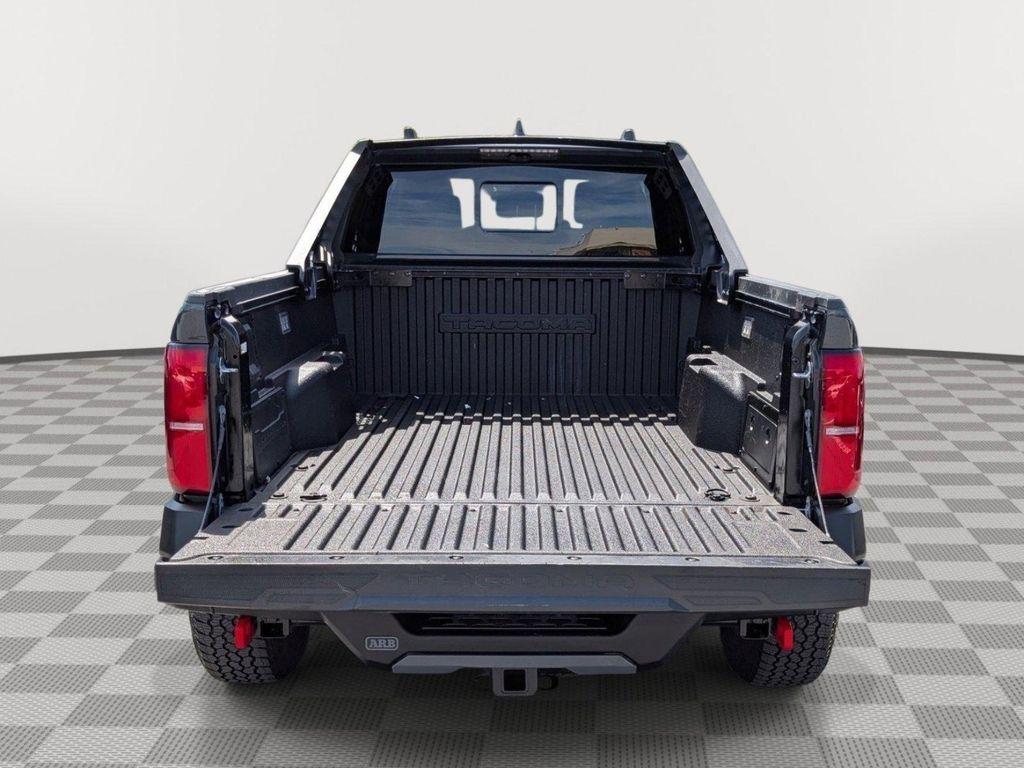 used 2025 Toyota Tacoma Hybrid car, priced at $56,299