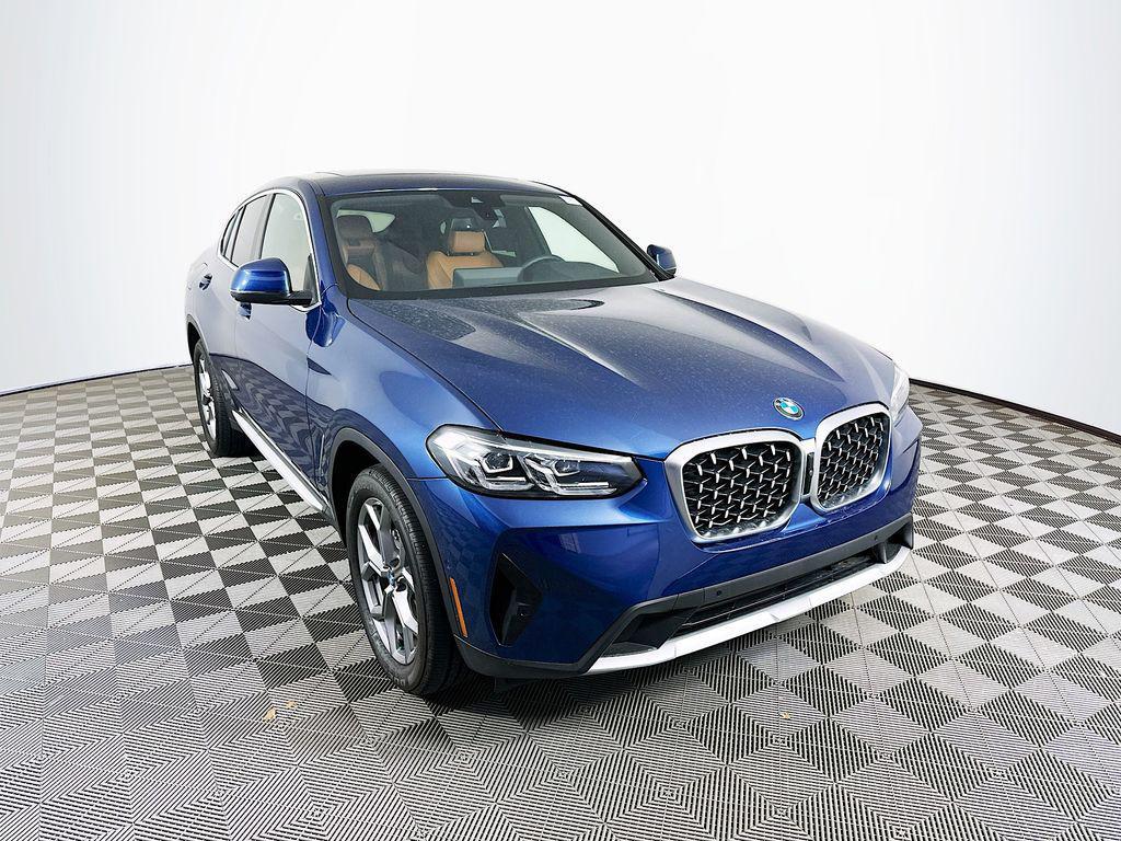 used 2025 BMW X4 car, priced at $49,499